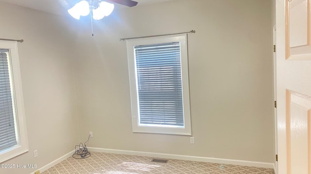 3772 Old Maco Rd NE, Leland, NC 28451 - spare room with baseboards, ceiling fan, and visible vents