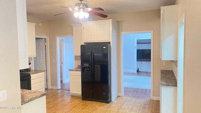 3772 Old Maco Rd NE, Leland, NC 28451 - kitchen with baseboards, ceiling fan, black appliances, and white cabinets