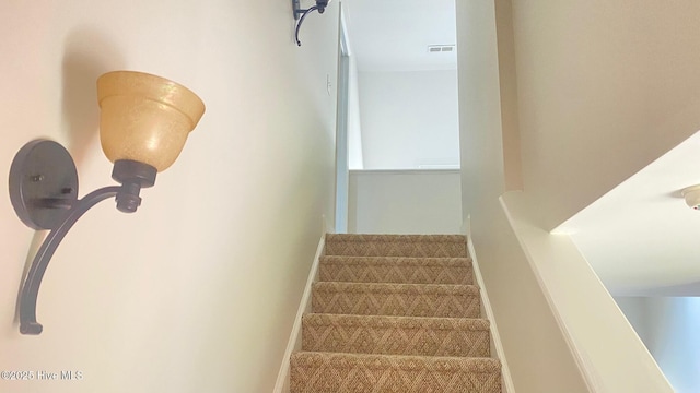 3772 Old Maco Rd NE, Leland, NC 28451 - stairs with baseboards and visible vents