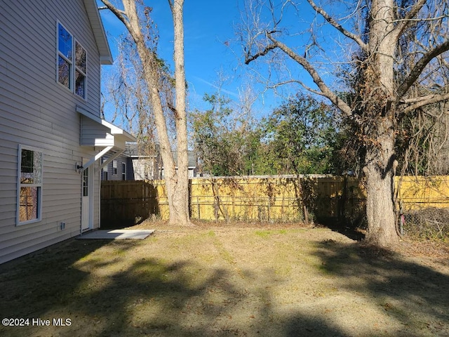 view of yard featuring fence