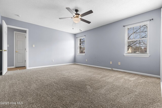 110 Vauhan Ct, Jacksonville, NC 28540 - carpeted empty room featuring a textured ceiling, a ceiling fan, and baseboards
