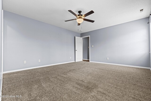 110 Vauhan Ct, Jacksonville, NC 28540 - carpeted spare room with visible vents, a ceiling fan, and baseboards