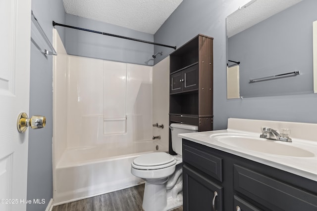 110 Vauhan Ct, Jacksonville, NC 28540 - bathroom featuring a textured ceiling,  shower combination, toilet, wood finished floors, and vanity