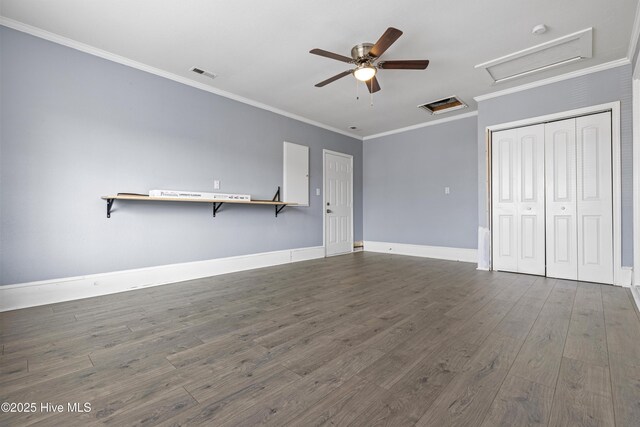 110 Vauhan Ct, Jacksonville, NC 28540 - unfurnished living room featuring attic access, crown molding, wood finished floors, and visible vents