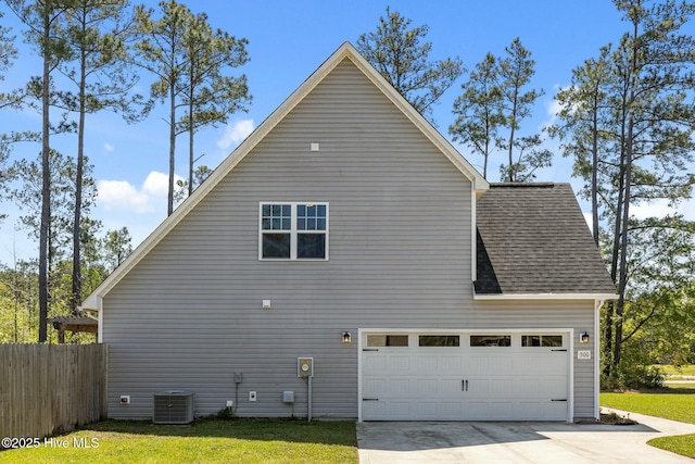 500 Maggies Ct, Jacksonville, NC 28540 - view of side of home featuring driveway, fence, cooling unit, a garage, and roof with shingles
