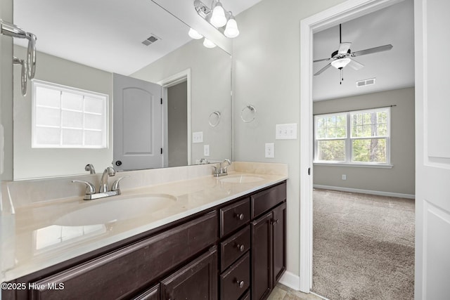 500 Maggies Ct, Jacksonville, NC 28540 - bathroom with a ceiling fan, a sink, and visible vents