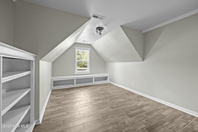 500 Maggies Ct, Jacksonville, NC 28540 - additional living space with wood finished floors, visible vents, and baseboards