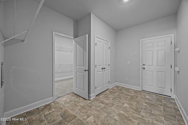 260 E Red Head Cir, Sneads Ferry, NC 28460 - interior space with stone finish floor and baseboards