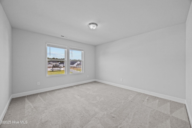 260 E Red Head Cir, Sneads Ferry, NC 28460 - carpeted empty room with visible vents and baseboards