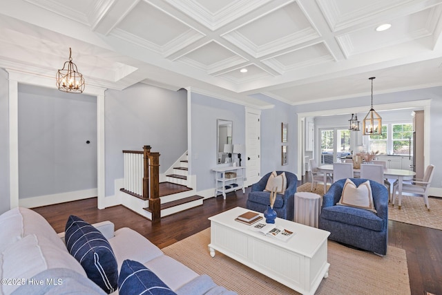half bath featuring a sink, toilet, baseboards, wood finished floors, and ornamental molding