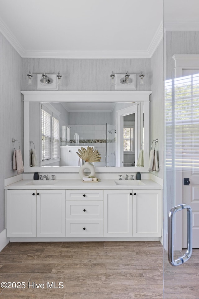 bathroom featuring a tile shower and ornamental molding