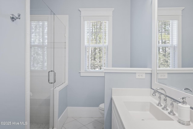 bathroom featuring tile patterned flooring, crown molding, and vanity