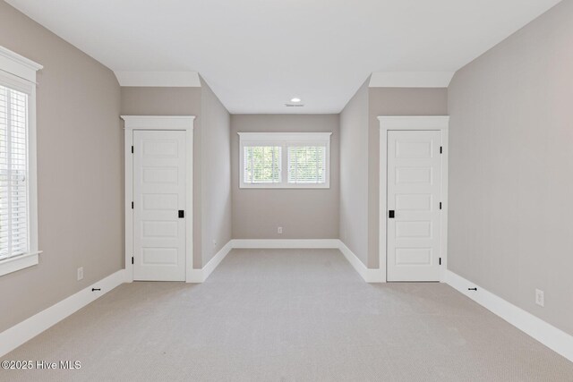 bathroom featuring vaulted ceiling, toilet, vanity, and washtub / shower combination