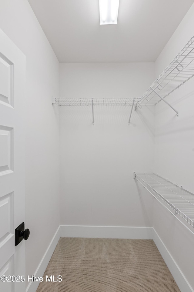 full bathroom featuring toilet, visible vents, vanity, and a shower