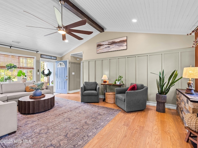 433 Dion Dr, Hubert, NC 28539 - living room with a decorative wall, a wainscoted wall, a ceiling fan, vaulted ceiling with beams, and wood finished floors