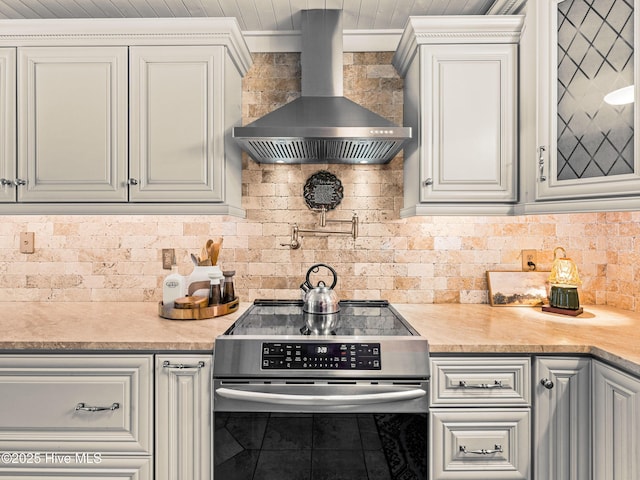 433 Dion Dr, Hubert, NC 28539 - kitchen featuring electric stove, tasteful backsplash, wall chimney range hood, and light countertops