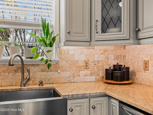 433 Dion Dr, Hubert, NC 28539 - kitchen featuring a sink, light countertops, tasteful backsplash, and stainless steel dishwasher