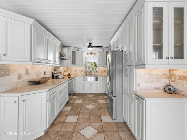 433 Dion Dr, Hubert, NC 28539 - kitchen featuring stainless steel appliances, a sink, backsplash, and light countertops