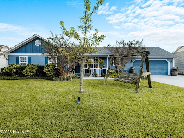 433 Dion Dr, Hubert, NC 28539 - ranch-style house with a porch, a garage, a front lawn, and driveway