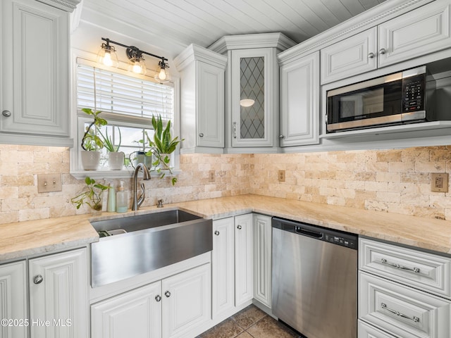 433 Dion Dr, Hubert, NC 28539 - kitchen featuring appliances with stainless steel finishes, a sink, tasteful backsplash, white cabinets, and wooden ceiling