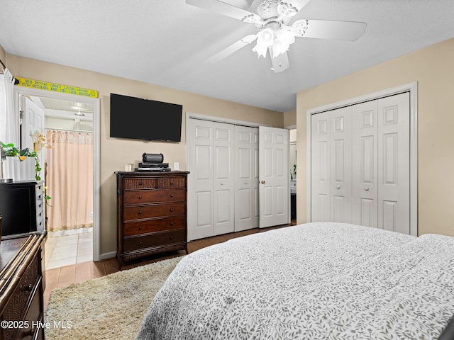 433 Dion Dr, Hubert, NC 28539 - bedroom with multiple closets, ceiling fan, and wood finished floors