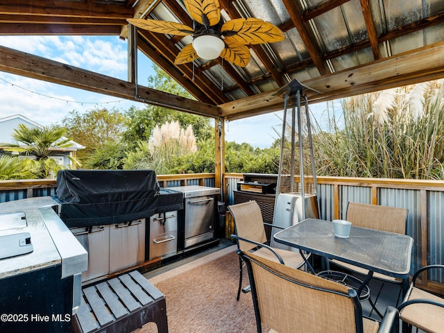 433 Dion Dr, Hubert, NC 28539 - view of patio / terrace featuring area for grilling, exterior kitchen, ceiling fan, and outdoor dining space