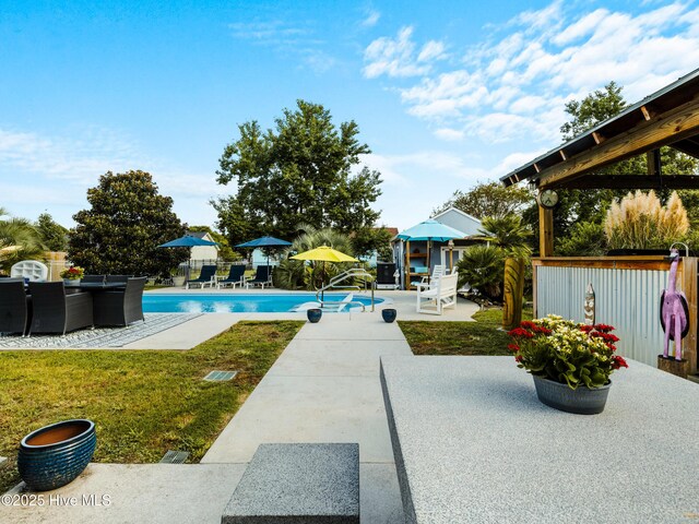 433 Dion Dr, Hubert, NC 28539 - view of swimming pool with a gazebo, a patio, and a lawn