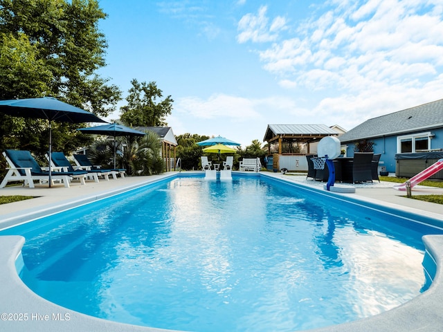 433 Dion Dr, Hubert, NC 28539 - view of swimming pool with a fenced in pool, fence, and a patio