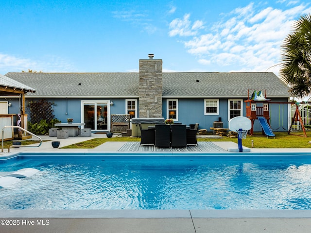 433 Dion Dr, Hubert, NC 28539 - view of swimming pool with a playground, a patio area, and outdoor dining area