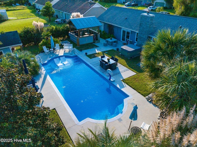 433 Dion Dr, Hubert, NC 28539 - pool with an outdoor kitchen, an outdoor living space, a fenced backyard, a patio, and a jacuzzi