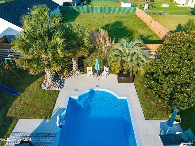 433 Dion Dr, Hubert, NC 28539 - view of swimming pool featuring a lawn, a fenced in pool, a patio, and a fenced backyard