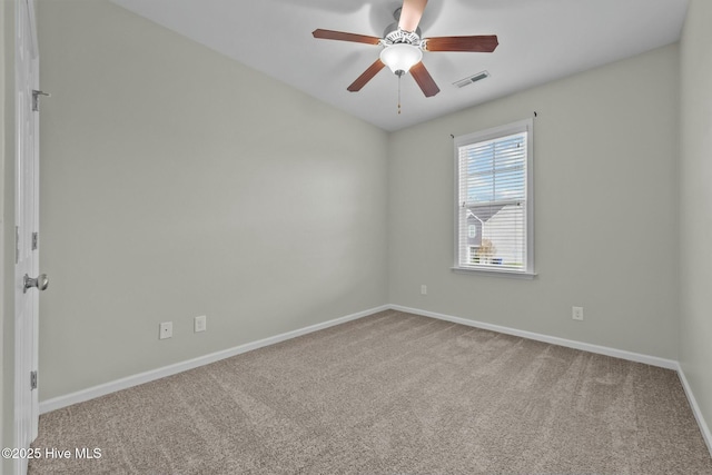 307 Cedar Island Trl, Holly Ridge, NC 28445 - spare room with visible vents, baseboards, ceiling fan, and carpet