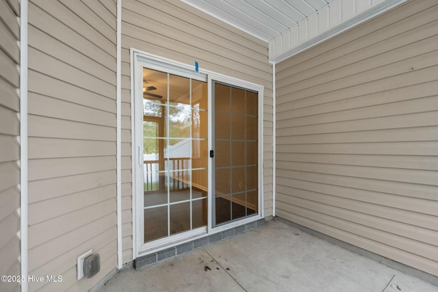 307 Cedar Island Trl, Holly Ridge, NC 28445 - view of exterior entry with a patio area