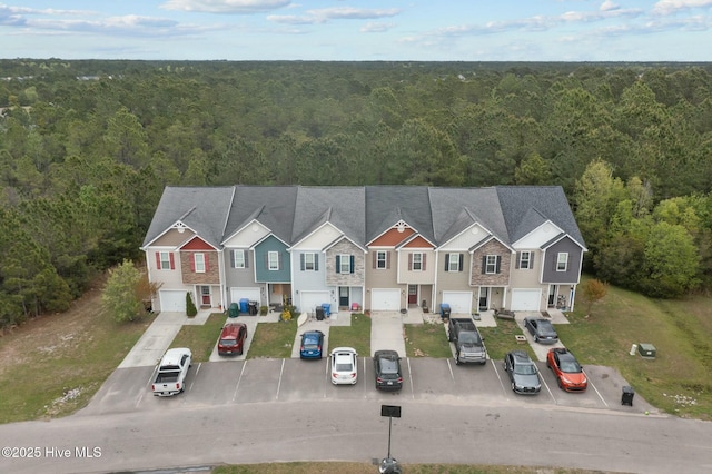 307 Cedar Island Trl, Holly Ridge, NC 28445 - birds eye view of property with a forest view