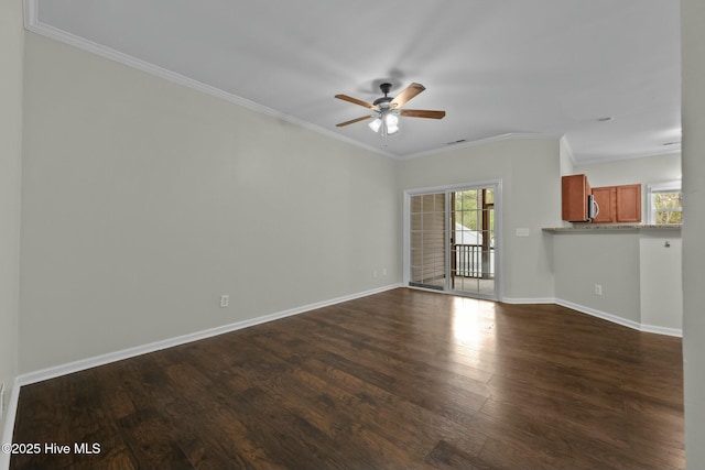 307 Cedar Island Trl, Holly Ridge, NC 28445 - unfurnished living room with crown molding, a ceiling fan, and dark wood finished floors