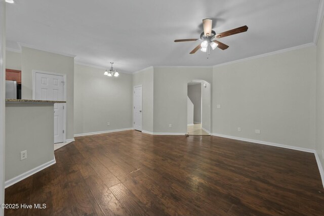 307 Cedar Island Trl, Holly Ridge, NC 28445 - unfurnished living room featuring baseboards, arched walkways, ornamental molding, wood finished floors, and ceiling fan with notable chandelier