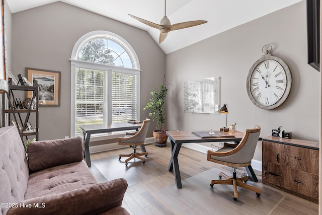 2592 St James Dr SE, Southport, NC 28461 - home office with lofted ceiling, ceiling fan, wood finished floors, and baseboards
