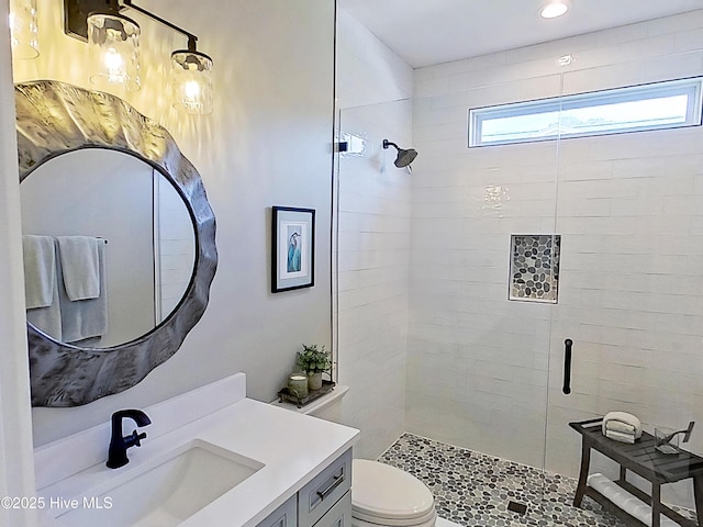 2592 St James Dr SE, Southport, NC 28461 - bathroom with a shower stall, vanity, and toilet