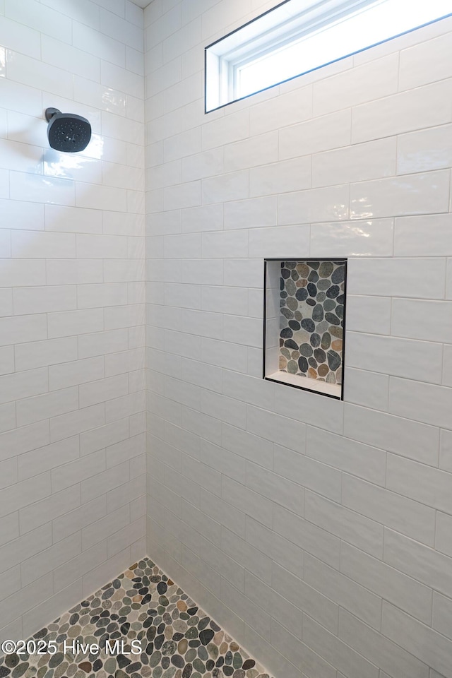 2592 St James Dr SE, Southport, NC 28461 - bathroom featuring tiled shower