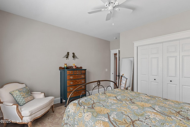 2592 St James Dr SE, Southport, NC 28461 - bedroom with a closet, a ceiling fan, and light wood-type flooring