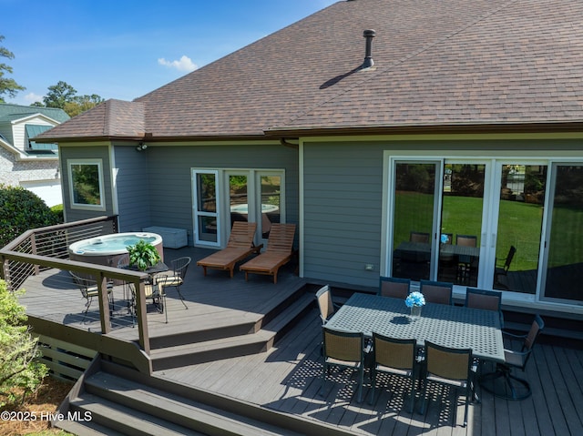 2592 St James Dr SE, Southport, NC 28461 - wooden terrace featuring outdoor dining area