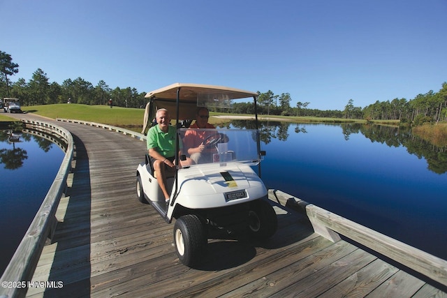 2592 St James Dr SE, Southport, NC 28461 - dock area with a water view and a yard