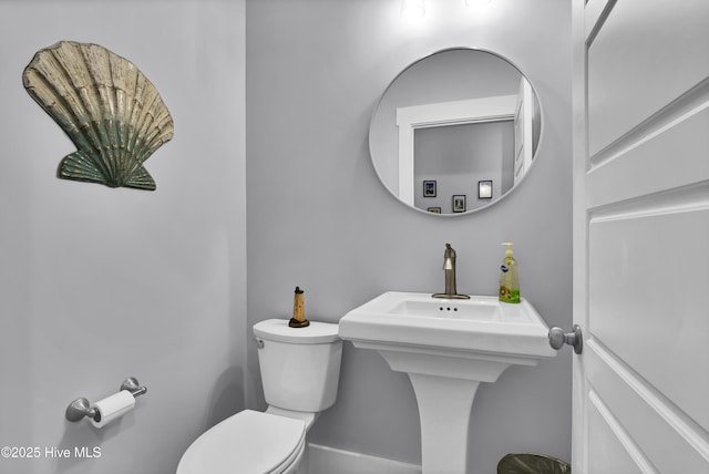 bathroom featuring toilet
