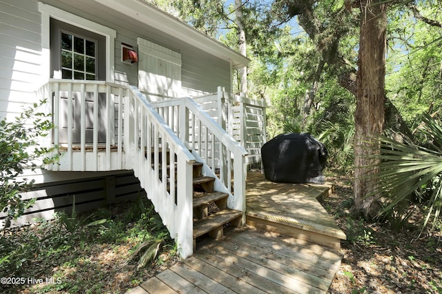 deck with grilling area and stairway