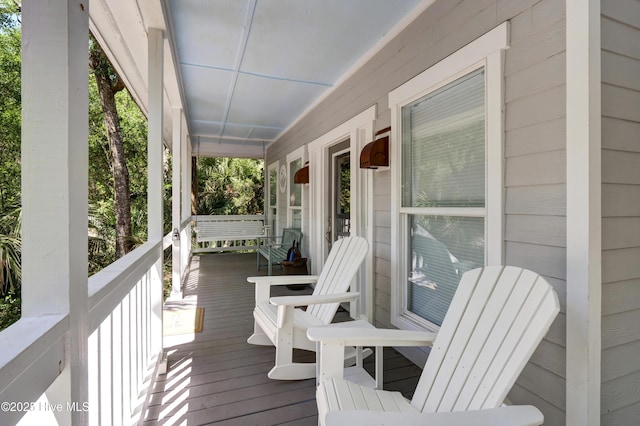 wooden terrace with covered porch