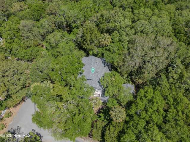 drone / aerial view with a view of trees