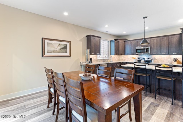 20 Barkley Ln, Pinehurst, NC 28374 - dining area with recessed lighting, light wood-type flooring, and baseboards