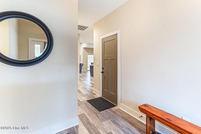 20 Barkley Ln, Pinehurst, NC 28374 - entryway featuring visible vents, baseboards, and wood finished floors