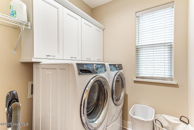 20 Barkley Ln, Pinehurst, NC 28374 - laundry area featuring separate washer and dryer, cabinet space, and a healthy amount of sunlight