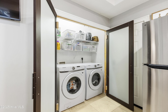 604 Lanvale Hills Cir, Leland, NC 28451 - clothes washing area with washer and clothes dryer and laundry area